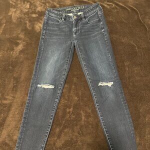 American Eagle Blue Ripped Super Stretch High Rise Jeggings